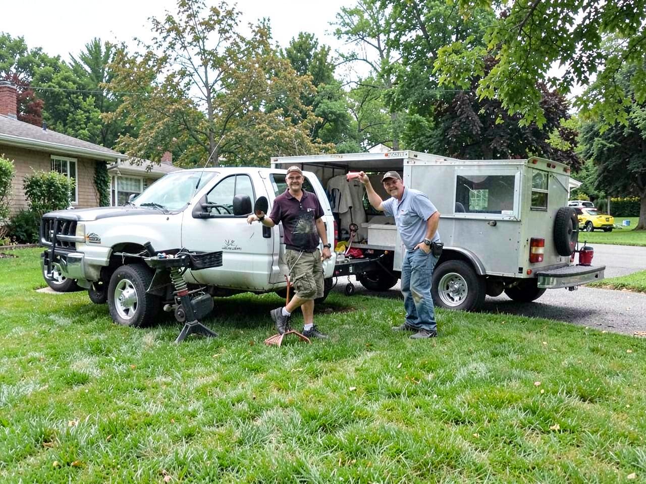 Summit Lawn & Landscape crew finishing work on a Boulder front yard
